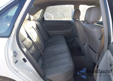 2004 Toyota Avalon Xl z USA, uszkodzony, nr VIN 4T1BF28B74U358523